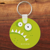 Unieke bruine boze, schimmelige, dunne, groene mon sleutelhanger (Voorkant)