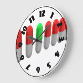 Unieke groene pil tussen rode capsules grote klok (Hoek)