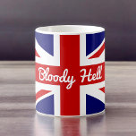 Unievaartuig vlag met Funny Quote Koffiemok<br><div class="desc">De kleurrijke rode witte en blauwe vlag van de Union Jack vlag van het Verenigd Koninkrijk hier getoond met een grappig bekend gezegde "Bloody Hell". Het woord bloederig... is een corruptie van Gods bloed, een uitdrukking die al gebruikt werd in de 17e eeuw... de hel werd later toegevoegd. Dit idioom...</div>