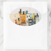 “Urban Cats in the Heights” Ovale Sticker (Tas)