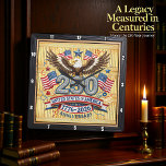 USA 250th Anniversary Heritage Rope Vierkante Klok<br><div class="desc">Celebrate a quarter-millennium of freedom with the USA 250th Anniversary Heritage Rope clock. This high-energy timepiece features a high-definition graphic that masterfully captures a unique, tactile craft aesthetic. The design centers on a majestic bald eagle with wings outspread, perched above a large "250" rendered in a thick, patriotic braided-rope texture....</div>