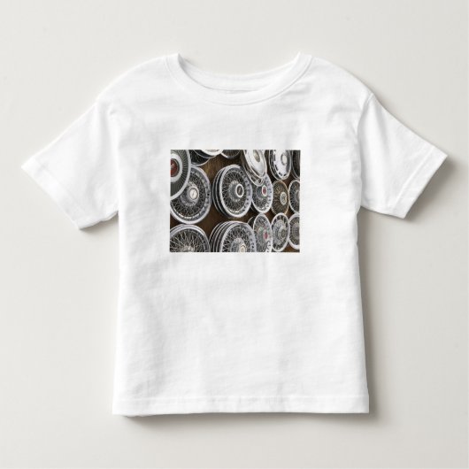 USA, New Mexico, Prewitt: Auto Hubcaps / Rt. 66 Kinder Shirts (Voorkant)