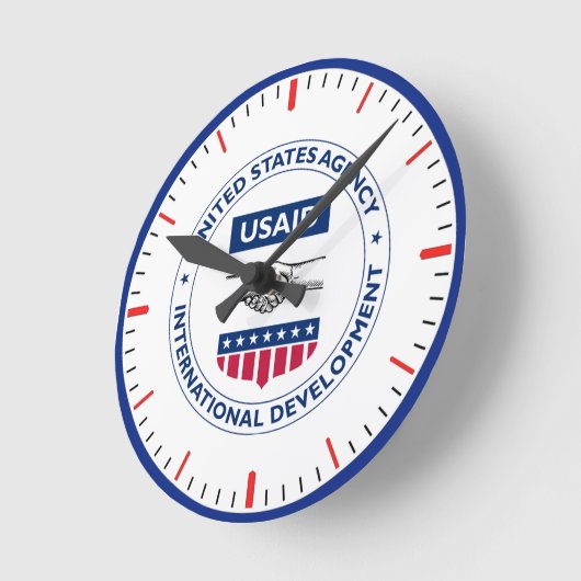 USAID Clock Ronde Klok (Hoek)