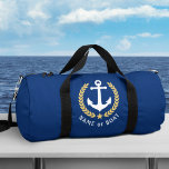 Uw boot of naam Anker Gold Laurel Star Navy Plunjezak<br><div class="desc">Een nautisch thema reis- of sportschool duffeltas met uw persoonlijke naam of bootnaam. Dit vorstelijke ontwerp heeft een bootanker in wit gemarkeerd met goudkleurige laurierbladeren en een gouden ster. De kleur van de tas is een rijke marineblauw of u kunt het ontwerp eenvoudig bewerken naar elke gewenste kleur. Met 2...</div>