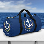 Uw boot of naam Anker Gold Laurel Star Navy Plunjezak<br><div class="desc">Een nautisch thema reis- of sportschool duffeltas met uw persoonlijke naam of bootnaam. Dit vorstelijke ontwerp heeft een bootanker in wit gemarkeerd met goudkleurige laurierbladeren en een gouden ster. De kleur van de tas is een rijke marineblauw of u kunt het ontwerp eenvoudig bewerken naar elke gewenste kleur. Met 2...</div>