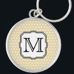 Uw brief. Aangepast monogram. Beige Polka Dot. Sleutelhanger<br><div class="desc">Witte en beige polka stippatroon. De zwarte brief van het initiaal van het monogram van de douane in een aardige doopvont,  voor u om in uw keus van brief of cijfer te veranderen. Dit ontwerp op het object is een plat afgedrukt afbeelding.</div>