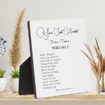 Uw Seat Wachten Bruiloft Tafelblad Plaque met Ezel Fotoplaat<br><div class="desc">Voeg een persoonlijk tintje toe aan uw huwelijksreceptie met deze prachtige tafelplaquette. Deze plaquette bevat de woorden "Your Seat Awaits" in een prachtig script lettertype, samen met jouw naam en trouwdatum. Het wordt geleverd met een ezel voor eenvoudige weergave op uw tafels of waar u maar wilt. Deze plaquette is...</div>