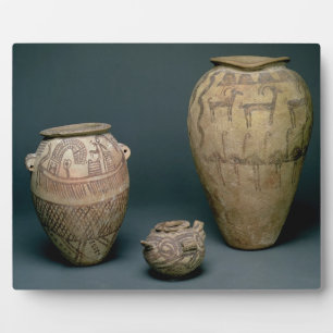 Vaas gedecoreerd met verschillende frites van dier fotoplaat