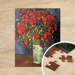 Vaas met rode papavers | Vincent van Gogh Legpuzzel<br><div class="desc">Vaas met rode klaprozen van Vincent van Gogh is een boeiend stilleven schilderij dat het levendige gebruik van kleur en expressief penseelwerk van de kunstenaar benadrukt. Het schilderij heeft een eenvoudige aarden vaas gevuld met gedurfde, karmozijnrode papavers, tegen een getextureerde, gedempte achtergrond. Het contrast tussen de levendige bloemen en de...</div>