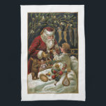 vader kerstcadeaus aan kind theedoek<br><div class="desc">Elegante en tijdloze traditionele kerstkunst met lachende roodgeklede kerstman die cadeaus geeft aan een kind in bed met kousen die in de buurt hangen en maretak boven. Kunst is verfraaid met gouden hoogtepunten en achtergrondkleur is bewerkbaar.</div>