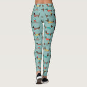Vakantie teckels met geschenken en sleeën patroon leggings (Achterkant)