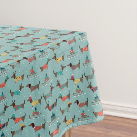 Vakantie teckels met geschenken en sleeën patroon tafelkleed (Voorbeeld)