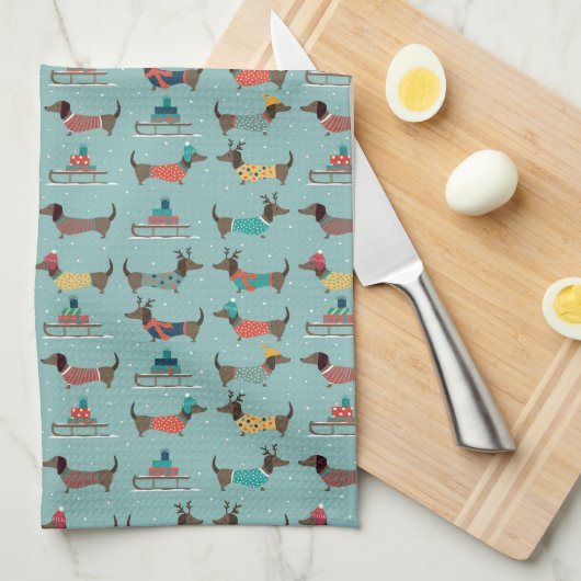 Vakantie teckels met geschenken en sleeën patroon theedoek (Quarter Fold)