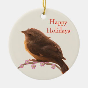 Vakantie vogeltje op beige keramisch ornament