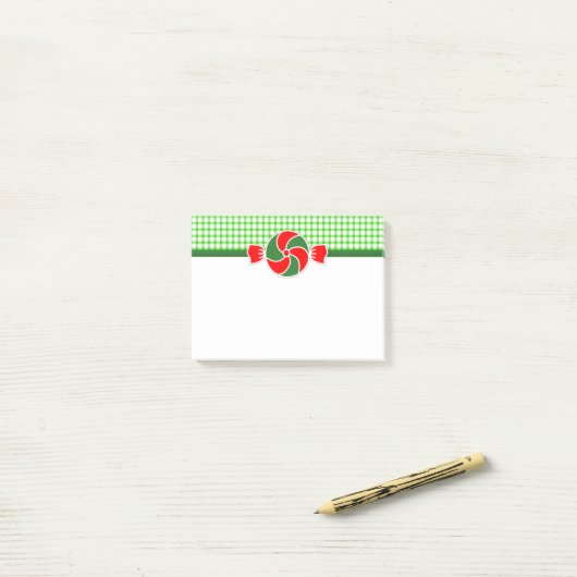 Vakantieppermints rood en groen post-it® notes (Op bureau)