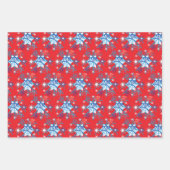 Vakantige rode en blauwe sneeuwvlokken en sterren inpakpapier vel (Voorkant)
