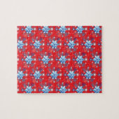 Vakantige rode en blauwe sneeuwvlokken en sterren legpuzzel (Horizontaal)
