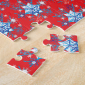 Vakantige rode en blauwe sneeuwvlokken en sterren legpuzzel (Zijkant)