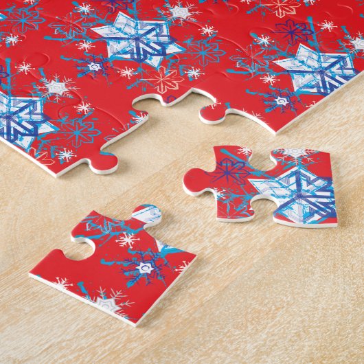 Vakantige rode en blauwe sneeuwvlokken en sterren legpuzzel (Zijkant)
