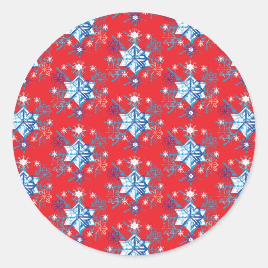 Vakantige rode en blauwe sneeuwvlokken en sterren ronde sticker (Voorkant)