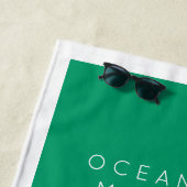 Vakbestemming familie, jaar en naam strandlaken (In situ)