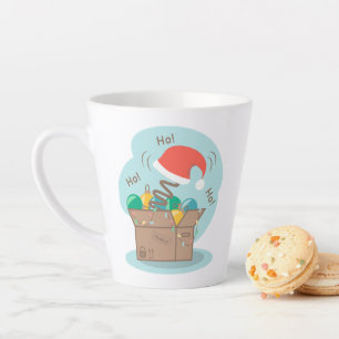 Vakkist met kerstversiering en kersthoed latte mok