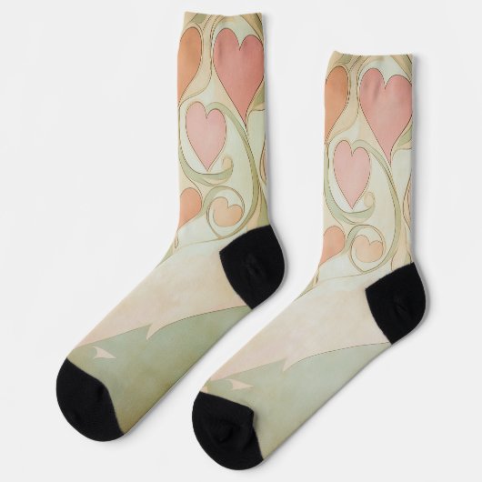 Valentijn harten achtergrond in bleek roze en groe sokken (Links)