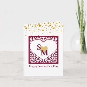 Valentijnsdag met rode initiaal en gouden hart