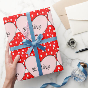 Valentijnsdag ompakken is een pijnlijk rood hart cadeaupapier