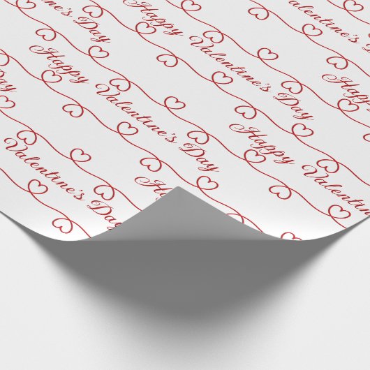 Valentijnsdag rode harten op wit cadeaupapier (Hoek)
