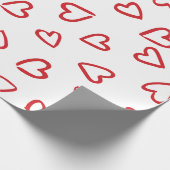 Valentijnsdag rood en wit hartpatroon cadeaupapier (Hoek)