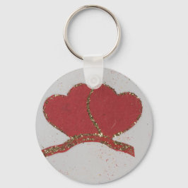 Valentijnse goudvonk met rood hart sleutelhanger