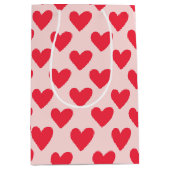 Valentijnse  rood en roze hartpatroon medium cadeauzakje (Voorkant)