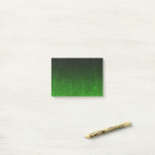 Valt zwart en groen glitterverloop post-it® notes (Op bureau)