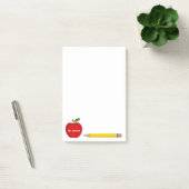 Van het bureau van de leraar rode appel post-it® notes (Kantoor)