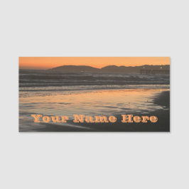 Van schemering tot schemering op het strand Foto a Naamplaatje