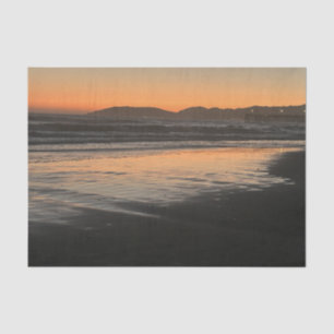 Van schemering tot schemering op het strand Foto a Tissuepapier