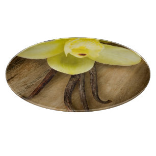 Vanilla Pods and Flower over Wooden Background Snijplank