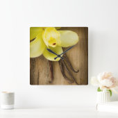 Vanilla Pods and Flower over Wooden Background Vierkante Klok (Huis)
