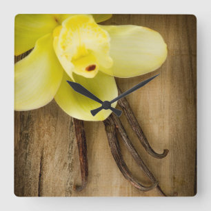 Vanilla Pods and Flower over Wooden Background Vierkante Klok