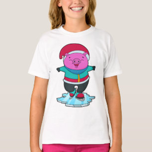 Varkens bij ijsschaatsen met ijs-schaatsen en -Pet T-shirt