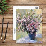 Vase van Flowers Claude Monet Briefkaart<br><div class="desc">Een briefkaart met het stilleven,  Vaas van Bloemen (1881-1882) van Claude Monet (1840-1926). Een blauwe vaas op een tafel met roze wilde mallow bloemen in de impressionistische stijl.</div>