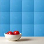 Vast cursief helderblauw tegeltje<br><div class="desc">Vast curieus helderblauw ontwerp.</div>