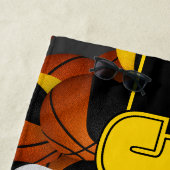 Veel basketballen meisjes of jongens team zwart go strandlaken (In situ)