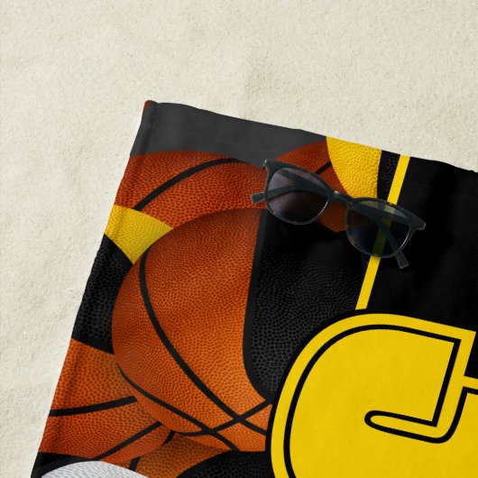 Veel basketballen meisjes of jongens team zwart go strandlaken (In situ)