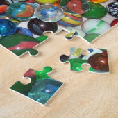 Veel kleurrijke marbles legpuzzel (Zijkant)