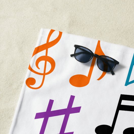 Veel kleurrijke Muzieknoten en Symbolen dragen han Strandlaken (In situ)