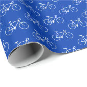 Veel witte fietsvormen op blauw cadeaupapier (Rol Hoek)