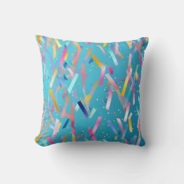 Veelkleurige confetti achtergrond op blauw kussen