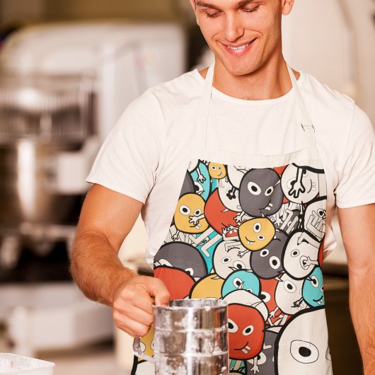 Veelkleurige doedel monster gezichten schort